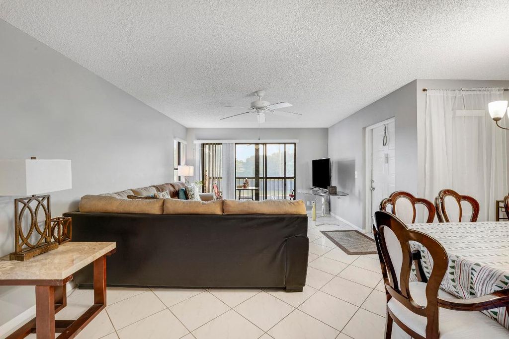 Photo of 821 Sky Pine Way #D2, Greenacres, FL 33415 (MLS # R11152827)