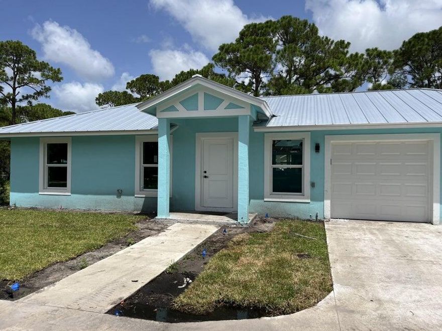 Welcome to a very especial area in Palm Beach Country Estates! Step into this beautifully newly builded 3 bed, 2 bath sanctuary situated on a spacious 1.5 acre lot. Your furry friend will love the large area outside and you will love this secluded area, parking for your vehicles or boat? No problem! The large driveway and circular driveway have you covered. Plus, enjoy the convenience of city drinking water and near distance to the beach and great restaurants, lawn care and pest control are on the house