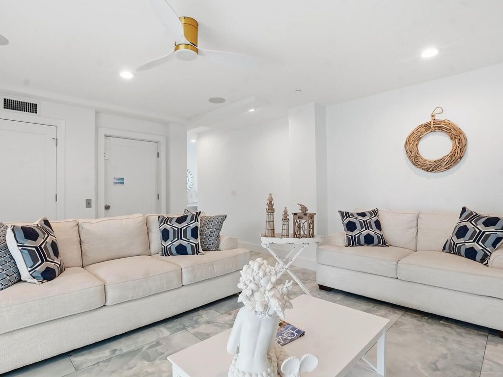 Photo of 519 Coral Sands Way, Hutchinson Island, FL 34949 (MLS # B26014938)