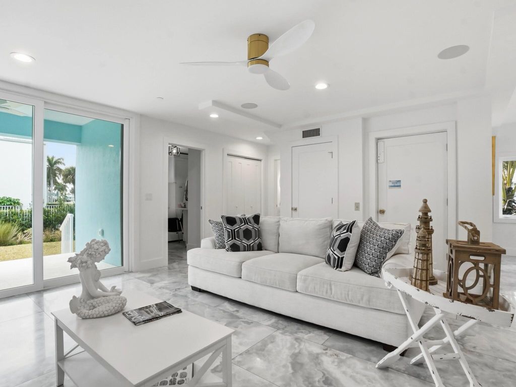 Photo of 519 Coral Sands Way, Hutchinson Island, FL 34949 (MLS # B26014938)
