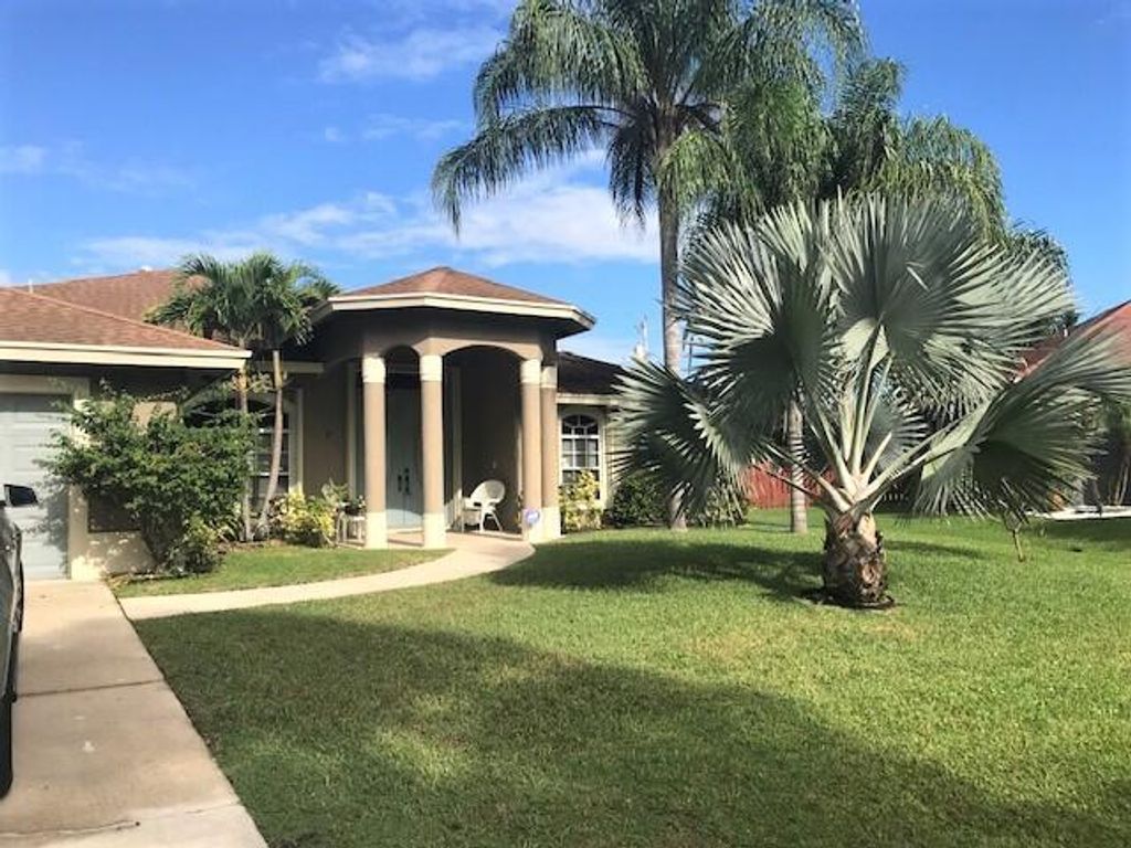 Photo of 2030 SW Brevity Terrace, Port Saint Lucie, FL 34953 (MLS # R10751449)