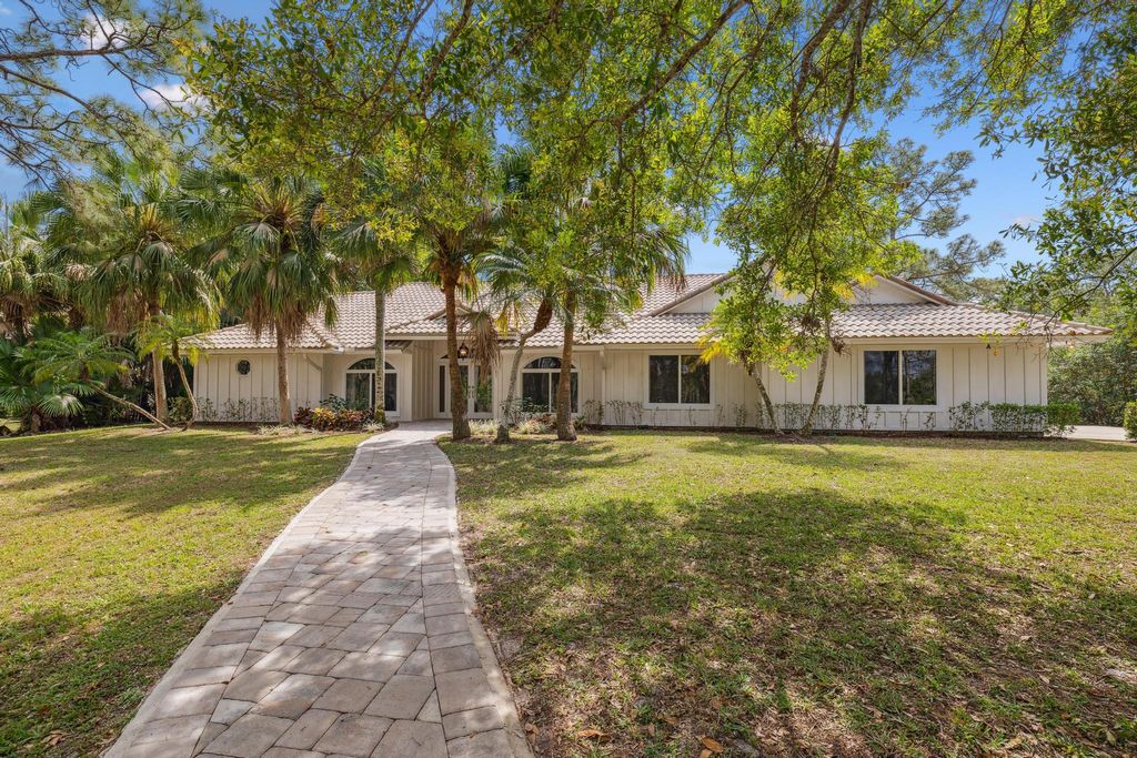 Photo of 1760 SE Colony Way, Jupiter, FL 33478 (MLS # R10862540)