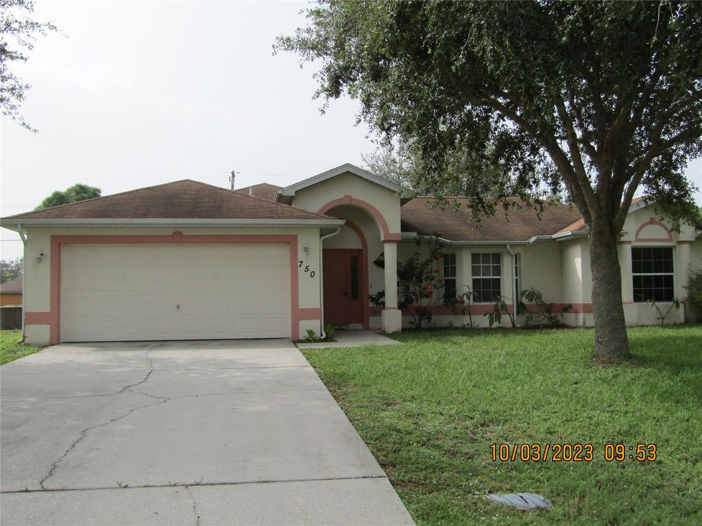 Photo of 750 SW Tupper Ln, Port St Lucie, FL 34953 (MLS # F10404756)