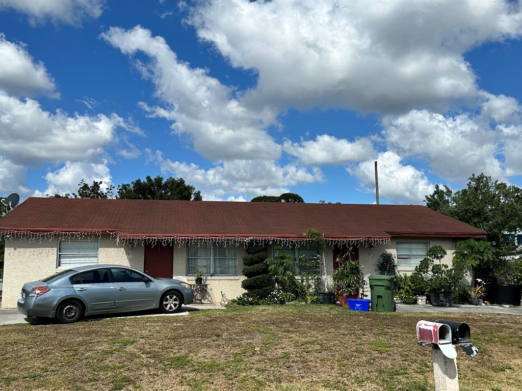 Photo of 3825 42nd Avenue S, Palm Springs, FL 33461 (MLS # R11083887)