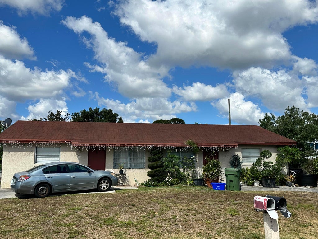 Photo of 3825 42nd Avenue S, Palm Springs, FL 33461 (MLS # R11083887)