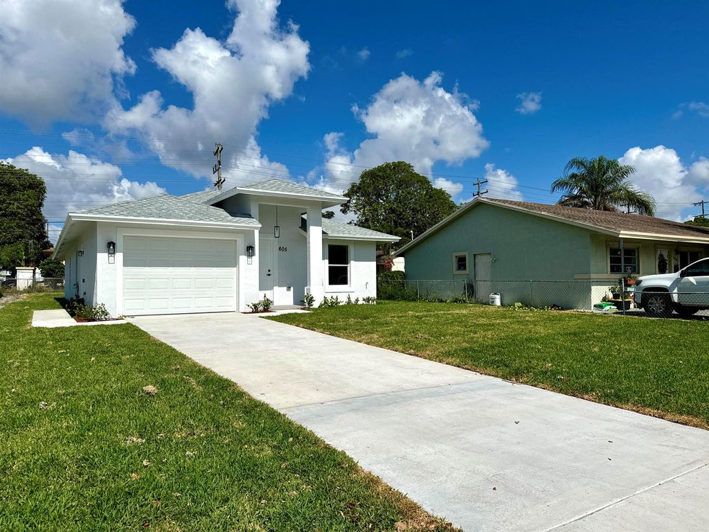 Photo of 605 N B Street, Lake Worth Beach, FL 33460 (MLS # R10984989)