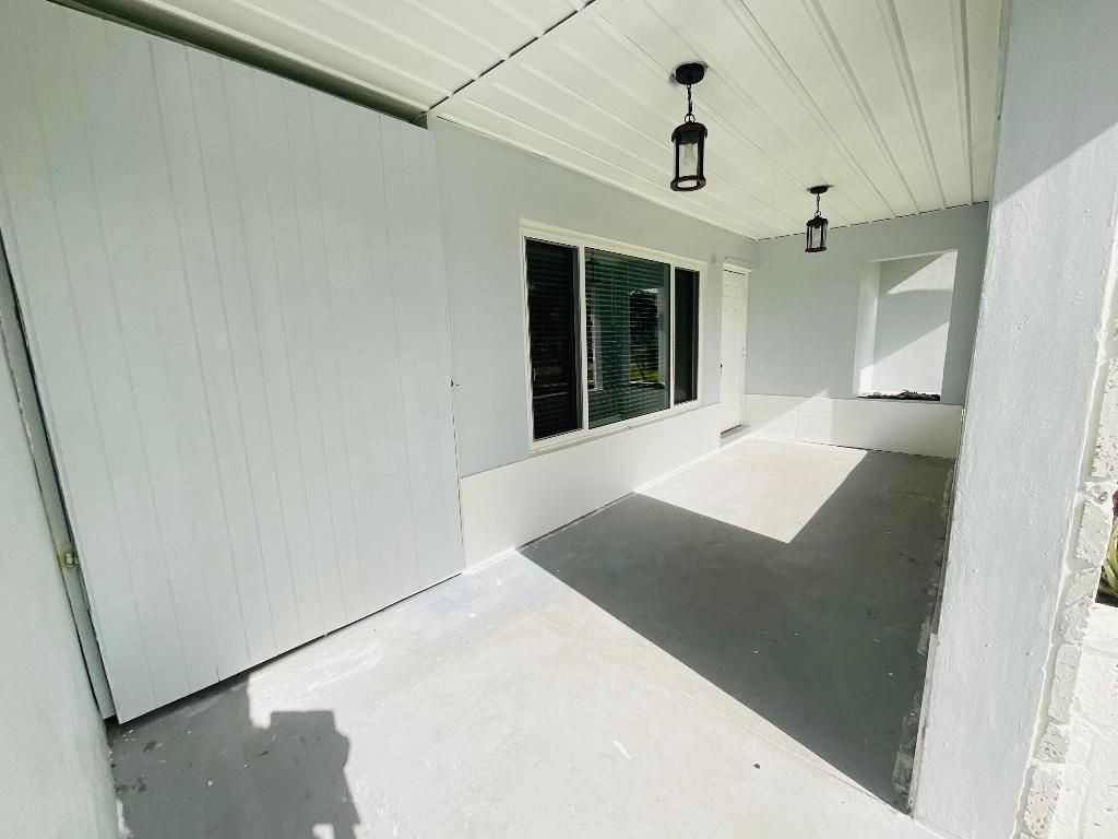 Photo of 864 SE Degan Drive, Port Saint Lucie, FL 34983 (MLS # R10976800)