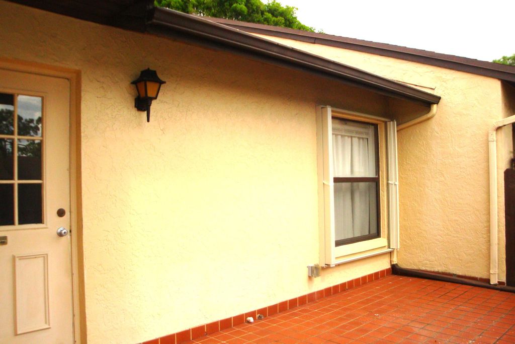 Photo of 803 Sky Pine Way #F, Greenacres, FL 33415 (MLS # R11029113)