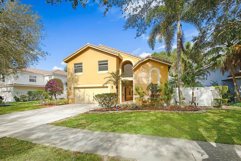 Photo of 5721 NW 60th Place, Parkland, FL 33067 (MLS # R11100765)