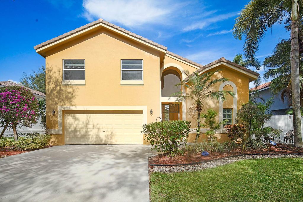 Photo of 5721 NW 60th Place, Parkland, FL 33067 (MLS # R11100765)