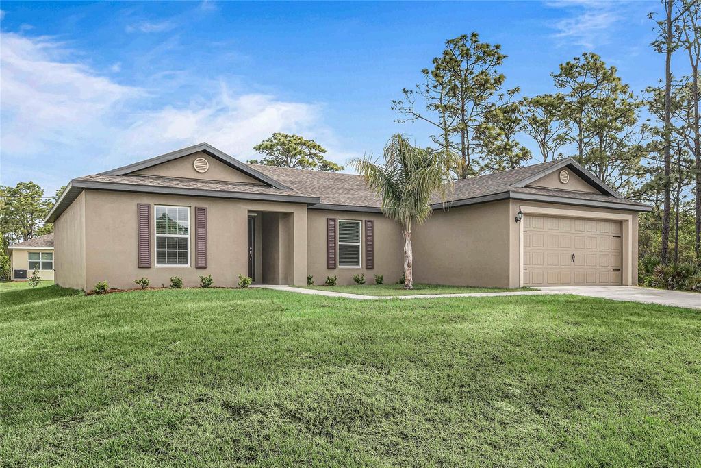 Photo of 3437 SW Rosser Blvd, Port St Lucie, FL 34953 (MLS # F10393479)