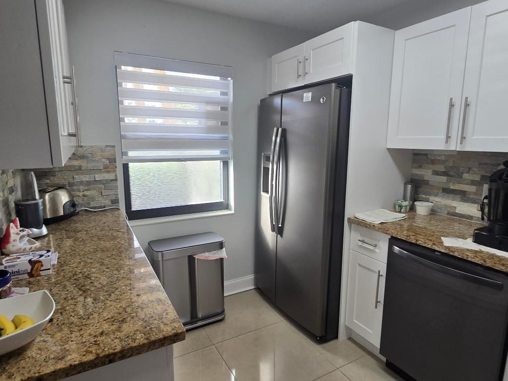 Photo of 140 Lake Nancy Lane #115, West Palm Beach, FL 33411 (MLS # R11152052)