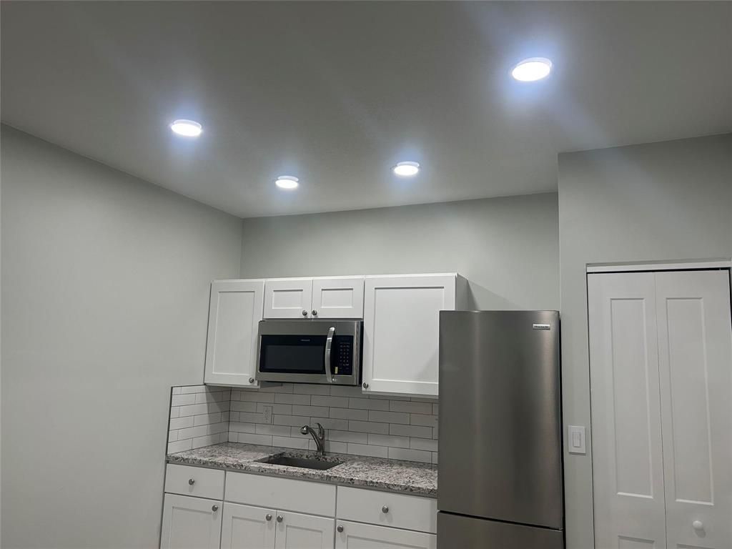 Photo of 135 W Ponce De Leon Street, Royal Palm Beach, FL 33411 (MLS # B26005953)