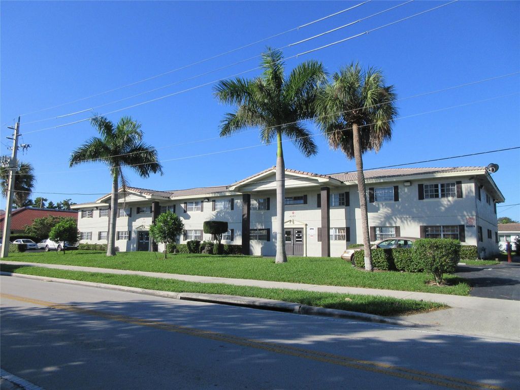 Photo of 4280 Woodside Drive #15, Coral Springs, FL 33065 (MLS # F10481507)