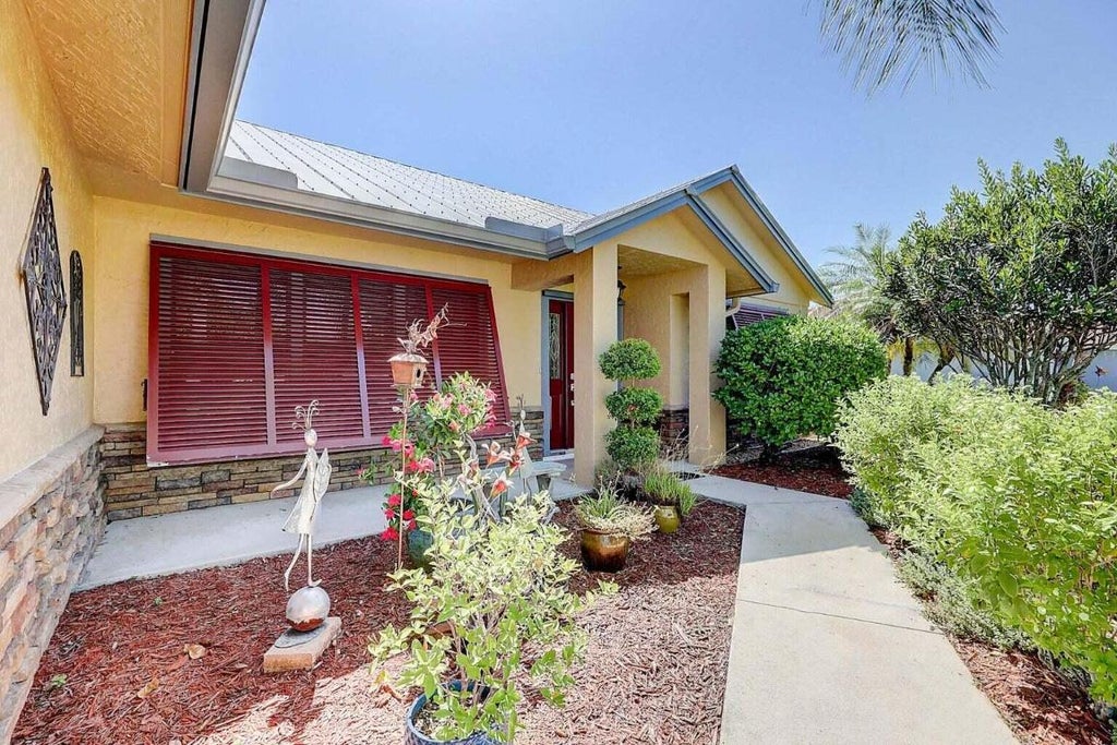Photo of 1631 SW Pancoast Street, Port Saint Lucie, FL 34987 (MLS # R10918587)