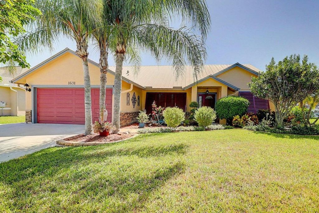 Photo of 1631 SW Pancoast Street, Port Saint Lucie, FL 34987 (MLS # R10918587)
