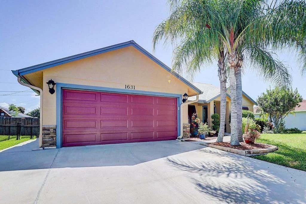 Photo of 1631 SW Pancoast Street, Port Saint Lucie, FL 34987 (MLS # R10918587)