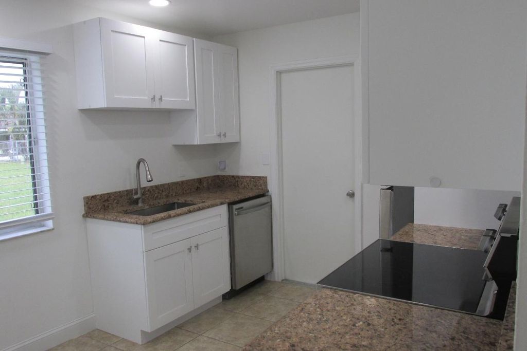 Photo of 837 SW Belmont Circle, Port Saint Lucie, FL 34953 (MLS # R10941738)