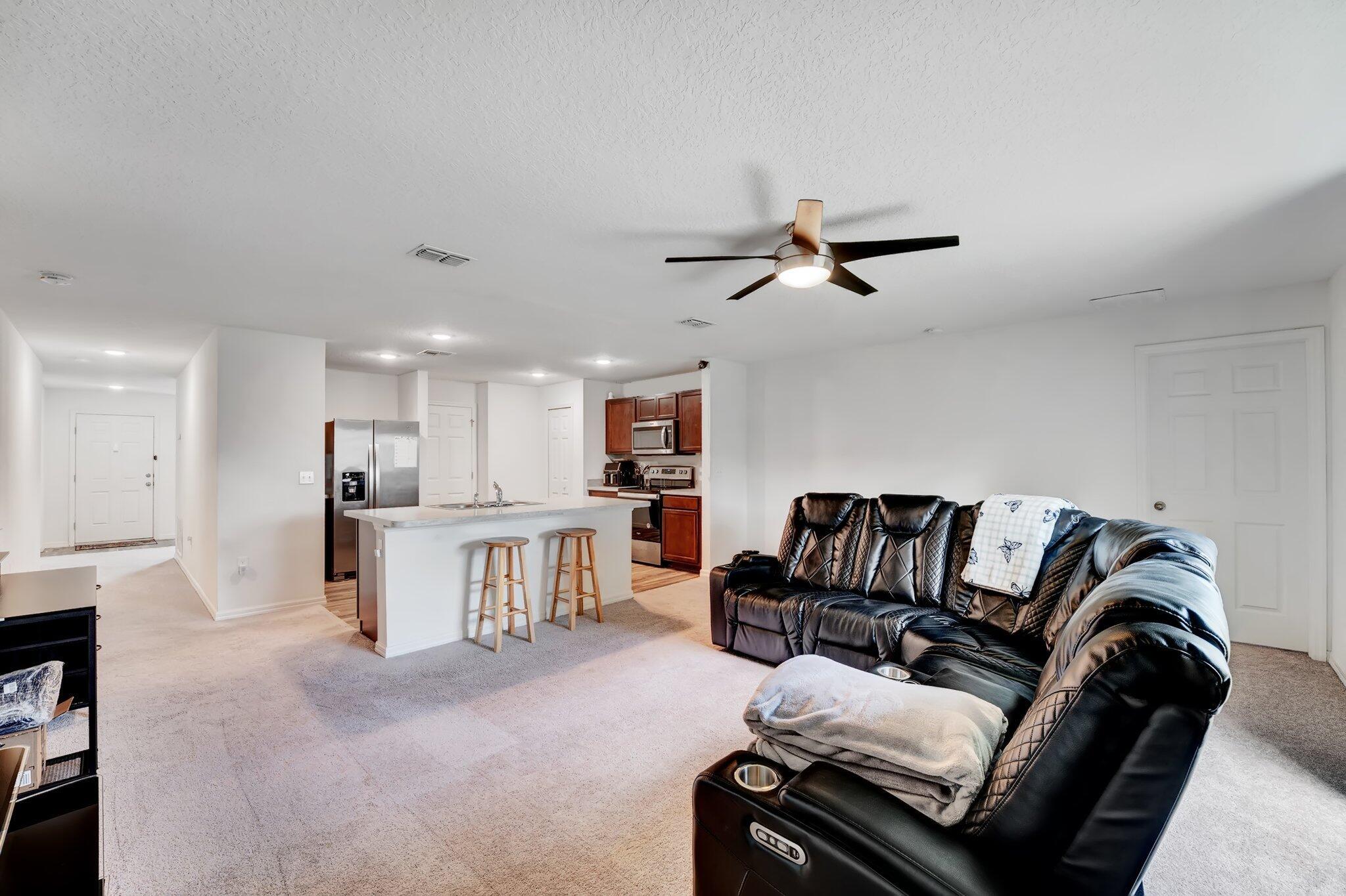 Step into opportunity and comfort with this 2021-built beauty--an ideal match for growing families or smart investors! This 4-bed, 2-bath home offers modern design, smart features and NO HOA, making it ideal for long-term living or rental income. Enjoy an open layout with LED lighting, dimmable fans, Whirlpool appliances, Samsung washer/dryer and a full CCTV security system. The 2-car garage includes a smart opener w/ integrated camera for peace of mind. The spacious backyard is perfect for kids, pets, or entertaining. Conveniently located near I-95, the Turnpike, Gatlin Blvd and Tradition, with schools, parks and shopping plazas just minutes away. Nearby favorites include Whispering Pines Park, PopStroke, Dave & Buster's and more. Comfort, location, flexibility--this home checks every box