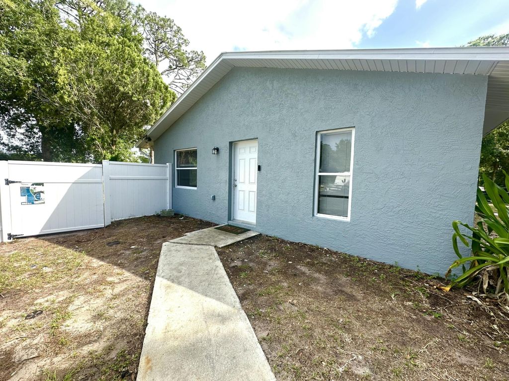 Photo of 5106 Sanibel Avenue, Fort Pierce, FL 34951 (MLS # B26017262)