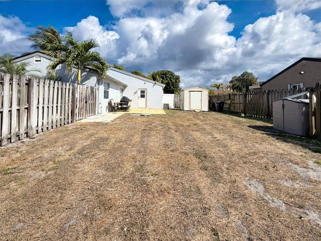 Photo of 4828 Gladiator Circle, Greenacres, FL 33463 (MLS # R11167763)