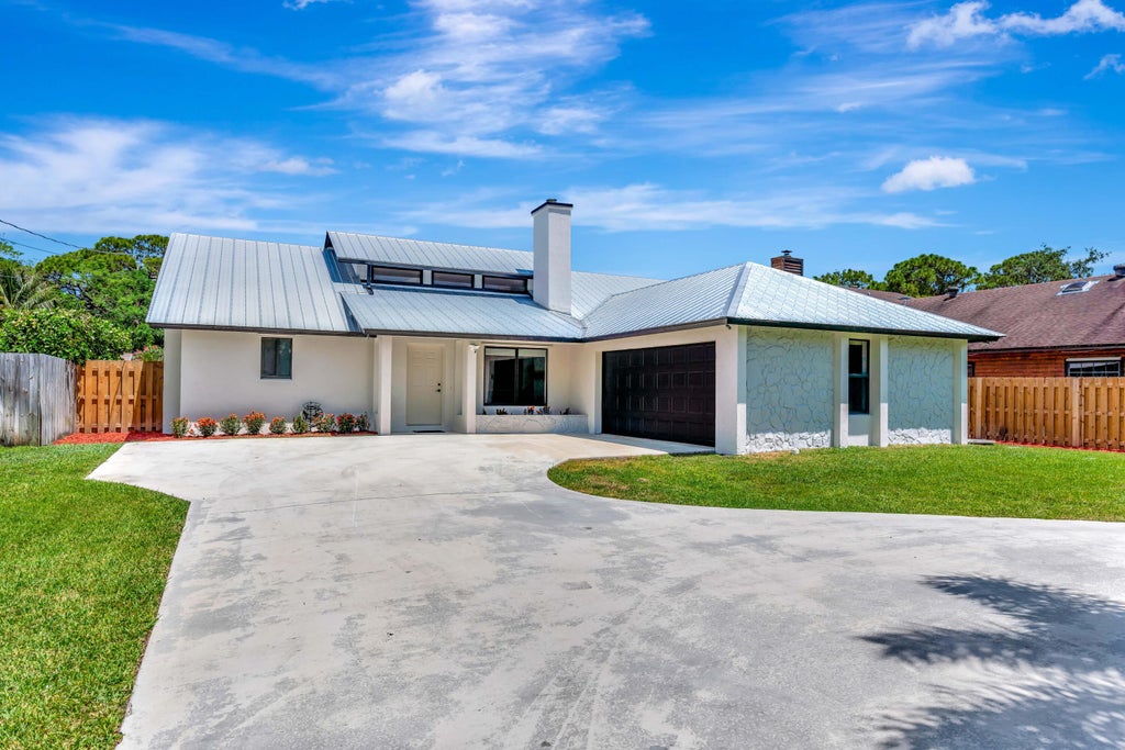Photo of 18975 SE County Line Road, Tequesta, FL 33469 (MLS # B26079884)