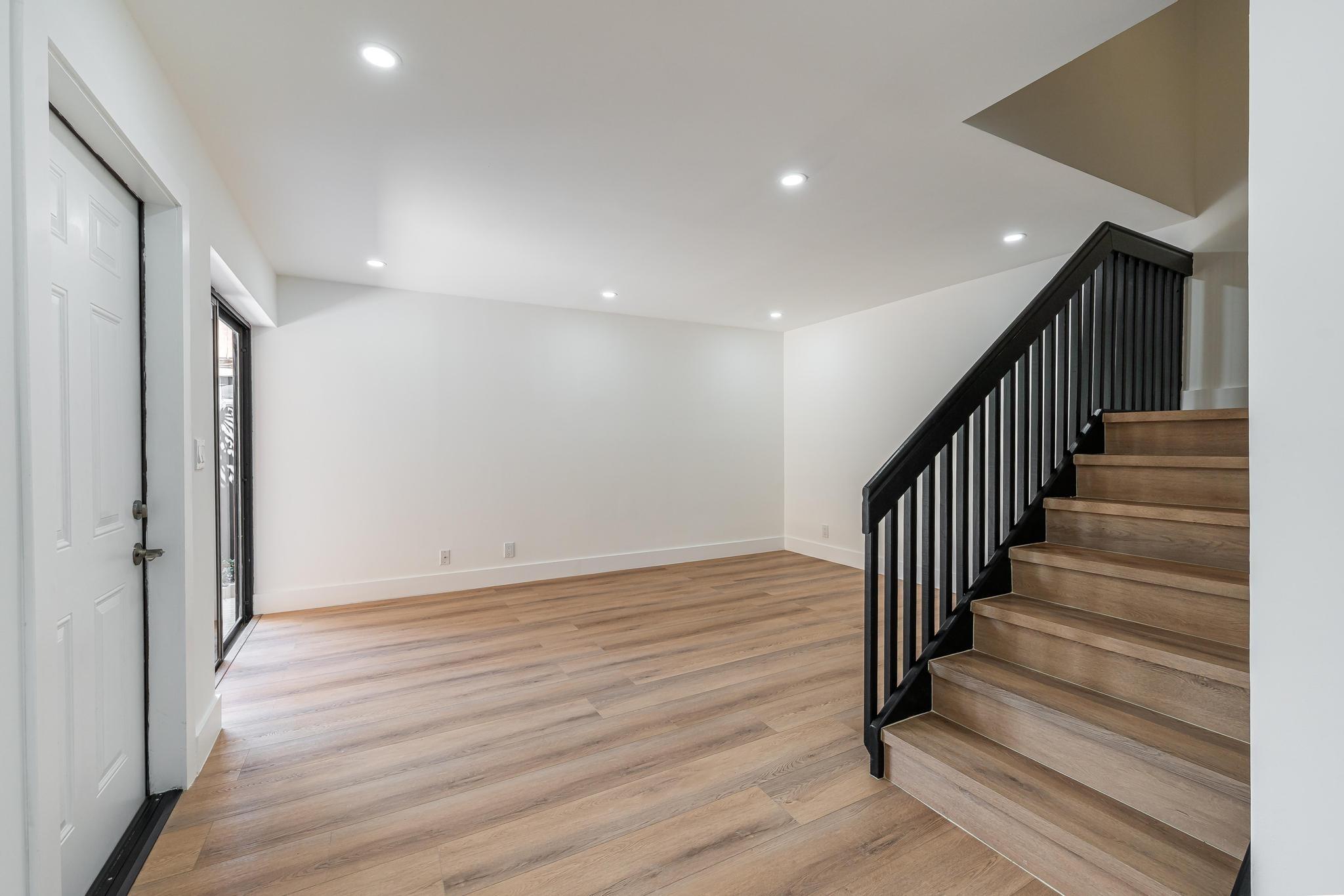 Nothing to do but bring your furniture!
This home is fee simple, so you won't face the typical financing restrictions and headaches of condos.
A new roof (2024) and low HOA fees give you peace of mind and affordability.
This stunning 3-bedroom, 2-bathroom townhouse has been fully remodeled from top to bottom, offering modern finishes and a fresh, inviting feel.
Step into a sleek, contemporary kitchen featuring modern cabinetry, quartz countertops, and stainless steel appliances. The bathrooms have been beautifully upgraded with luxurious 24"x48" tiles, new vanities, and LED mirrors, creating a spa-like atmosphere.
Enjoy new vinyl flooring throughout for a clean and cohesive look, plus a spacious private patio perfect for entertaining or relaxing outdoors.