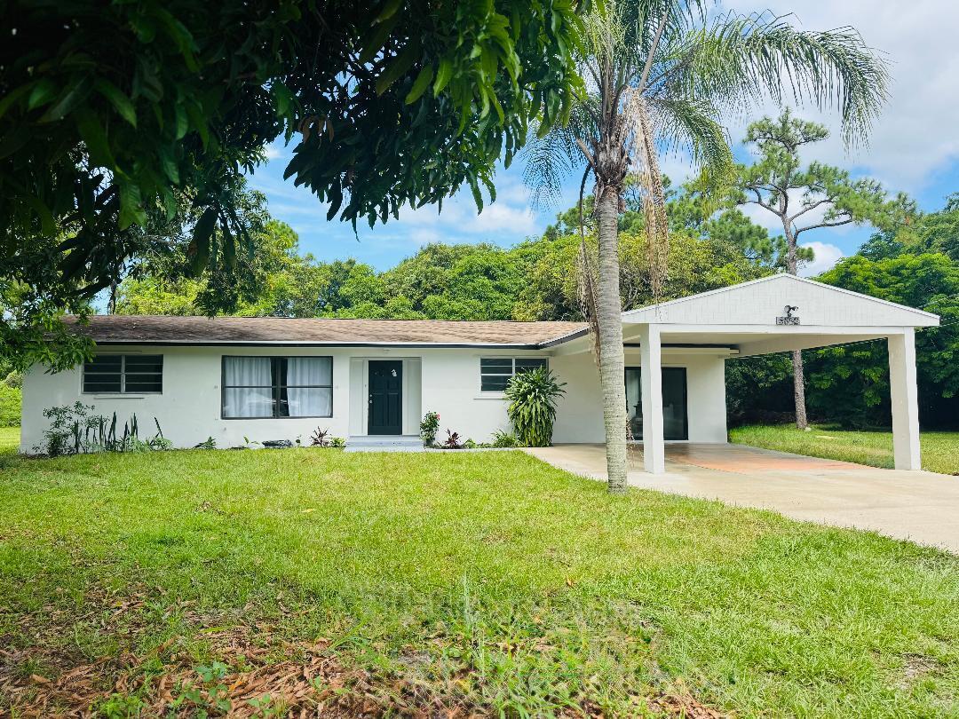 Welcome to Mango Manor!!! Move in Ready and Recently Upgraded 3 Bedroom, 2 Bathroom Home, Featuring a Large Utility Room, and Spacious Flex Room. The Kitchen features Brand New Cabinetry, Quartz Countertops, and Gas Range. Both Bathrooms have been completed with New Tile and Vanities. New waterproof LVP is throughout. Brand new Gas Water Heater, New AC and New Washer & Dryer installed as well.. Enjoy the Large Backyard with Fresh Sod and create your own personal garden space or add additional fruit trees to the multiple mango's on site. ***SELLER IS OFFERING CONCESSIONS to Buy Down Rate or for additional upgrades. ***