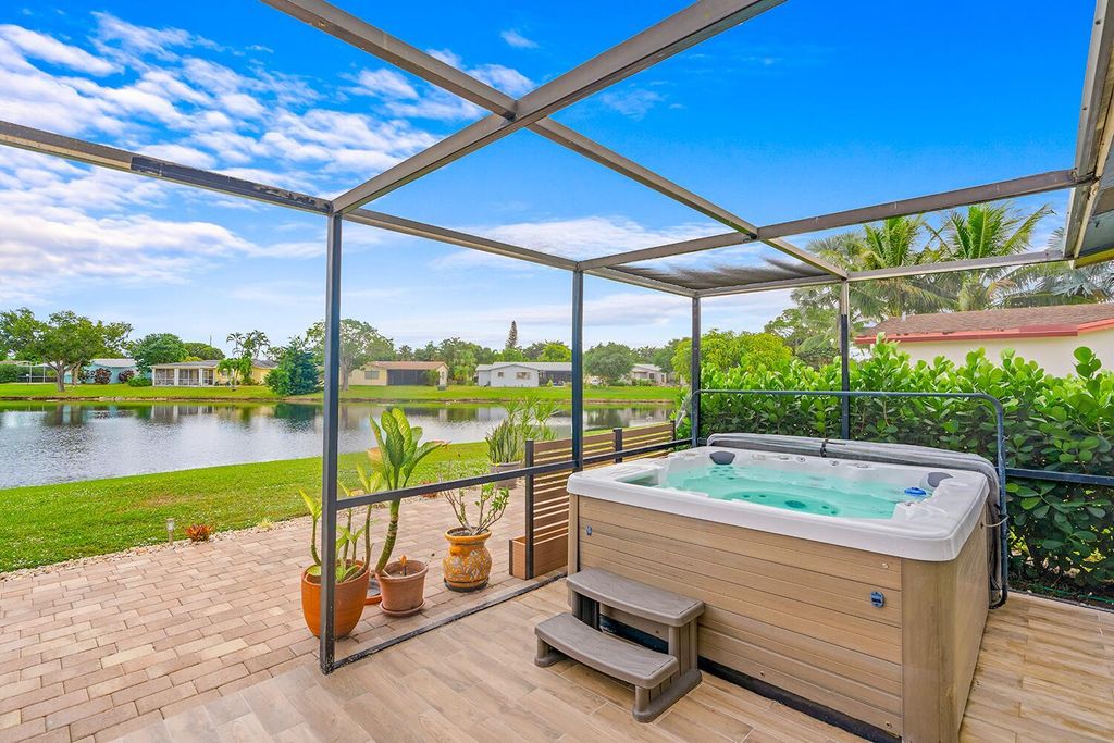 Photo of 14624 Country Side Lane, Delray Beach, FL 33484 (MLS # R11149155)