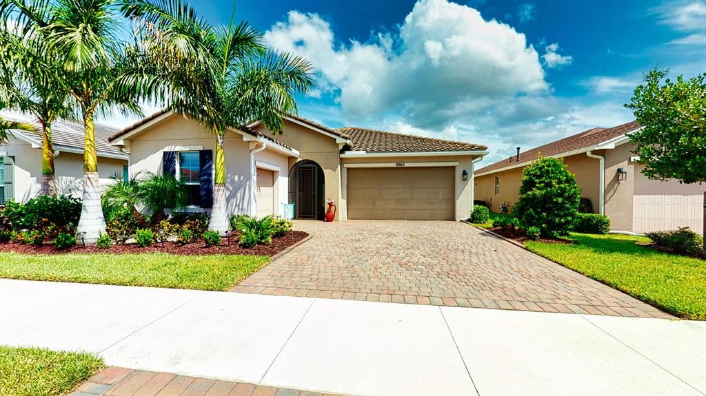 Photo of 10165 SW Coral Tree Circle, Port St Lucie, FL 34987 (MLS # R10821738)