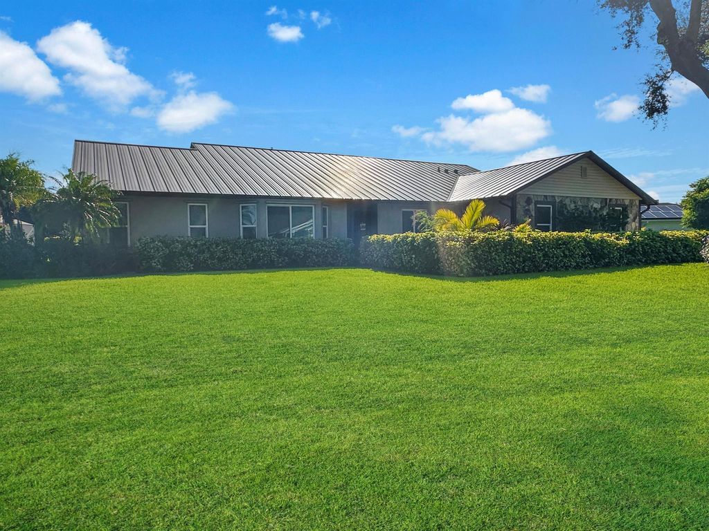 Photo of 5100 Eagle Drive, Fort Pierce, FL 34951 (MLS # R11120565)