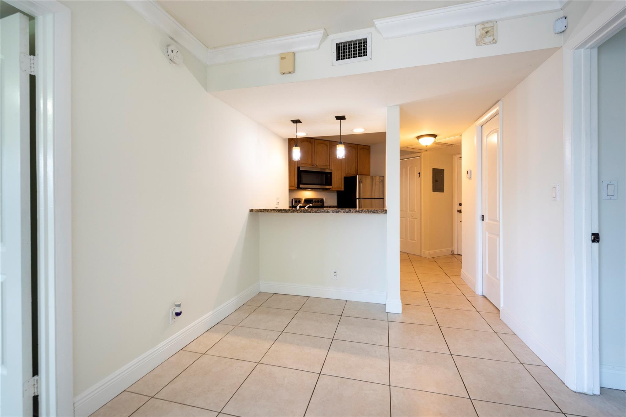 Beautiful, 2BR/2BA with SPLIT FLOORPLAN & wonderful tennis court views in the desirable Plantation Racquet Club. Unit features updated kitchen & bathrooms, in-unit washer/dryer, tiled floors throughout, lots of storage, & a screened-in balcony overlooking the tennis courts. Freshly painted unit. Primary ensuite with great walk-in closet space, & private sliding doors to the balcony. Accordion shutters for all windows & doors. Additional storage for unit. Community features pool, spa, tennis courts, clubhouse, & kids play area. Great location, close to shopping & dining, including Sawgrass Mills Mall, Colleges & Universities, & easy access to I-595 & I-75.