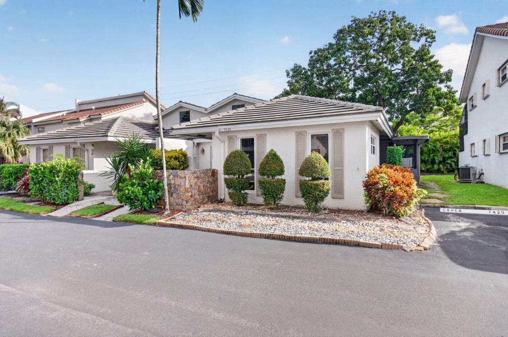 Photo of 7420 CHAMPAGNE Place, Boca Raton, FL 33433 (MLS # B26091410)