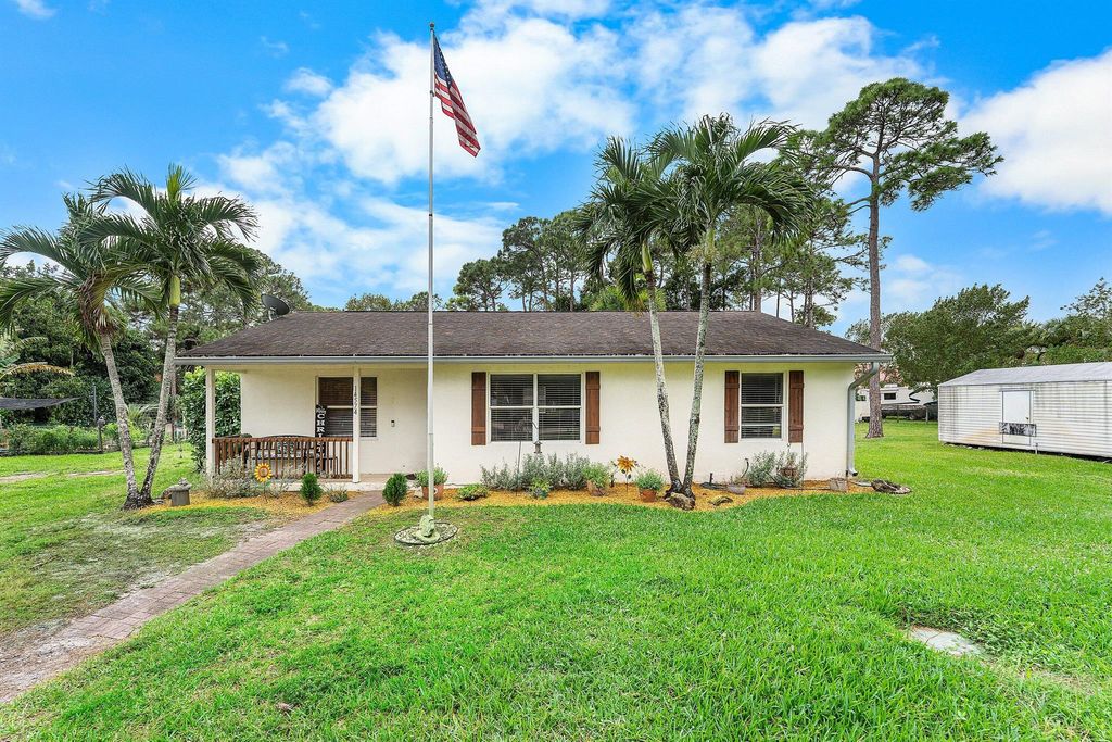 Photo of 14574 83rd Lane N, Loxahatchee, FL 33470 (MLS # R11148412)