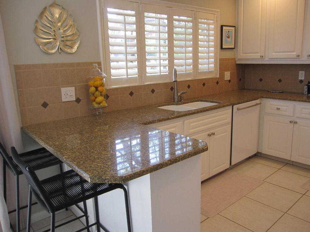 Photo of 10 Sailfish Lane, Ocean Ridge, FL 33435 (MLS # R10956309)