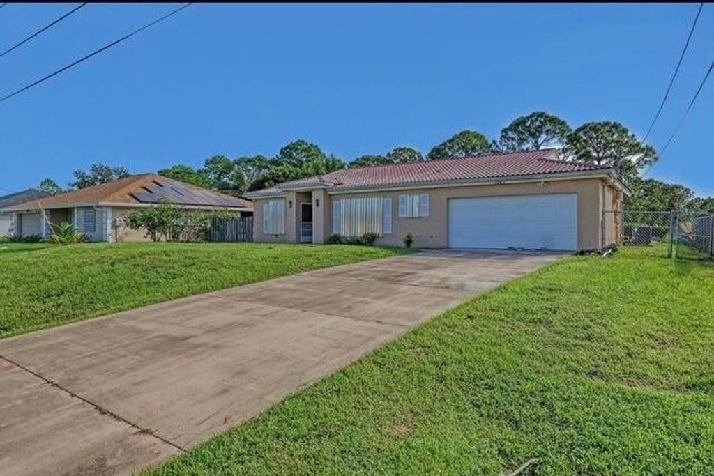 Photo of 3185 SW Hambrick Street, Port Saint Lucie, FL 34953 (MLS # R11047585)