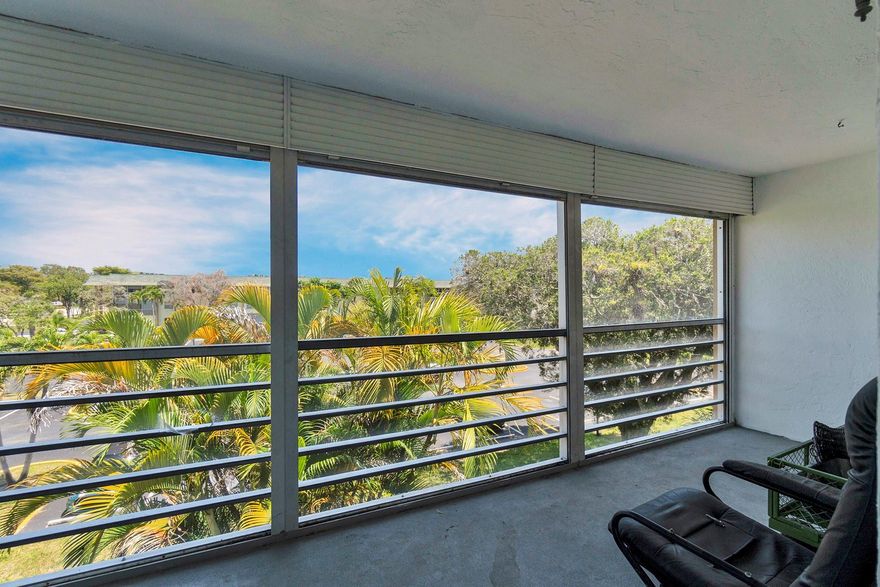 Welcome to this spacious 2-bedroom, 2-bathroom condo located in the desirable 55+ community of Sabal Palm. This well-maintained unit features two beautifully remodeled bathrooms with modern finishes and frameless glass showers. Both bedrooms are generously sized, with one offering a walk-in closet for ample storage. The large living area flows into a separate dining space, perfect for entertaining. While the kitchen retains its original charm, it offers great potential for customization. Enjoy the Florida lifestyle on the oversized screened-in patio, complete with roll-down shutters for added comfort and storm protection. Don't miss the opportunity to make this lovely condo your own in a vibrant and active community! Price just reduced for kitchen remodel.