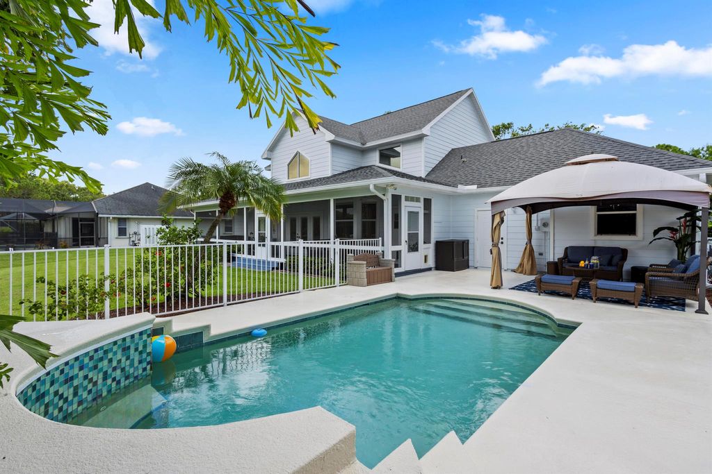 Photo of 1045 SW Sand Oak Drive, Palm City, FL 34990 (MLS # R10995751)