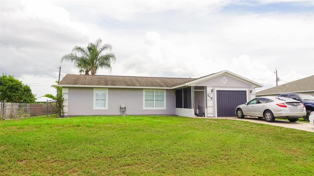 Photo of 514 SW Butler Avenue Ave, Port St Lucie, FL 34983 (MLS # R10723991)