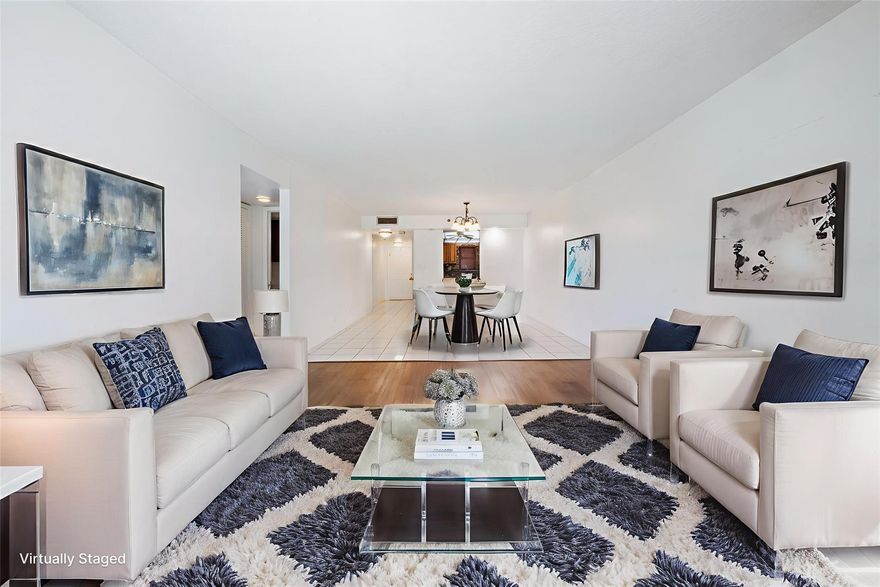 Step into comfort and charm at this beautifully maintained 2-bedroom, 2-bath condo in the highly sought-after Rolling Hills community. Nestled on the second floor, this sunny, inviting residence boasts expansive lake & golf course views from your private, screened-in balcony—perfect for morning coffee or evening unwinding. Inside, you'll find a bright, open layout with neutral tile flooring throughout, impact windows, spacious bedrooms in a split-plan design for privacy, and generous closet space. The kitchen seamlessly flows into the dining and living areas, creating a natural space for hosting or relaxing. The community offers a sparkling pool, well-kept grounds, and laundry on each floor. Located just minutes from Nova Southeastern University, major highways, dining, and shopping.