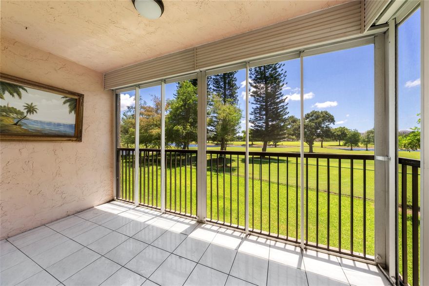 Step into comfort and charm at this beautifully maintained 2-bedroom, 2-bath condo in the highly sought-after Rolling Hills community. Nestled on the second floor, this sunny, inviting residence boasts expansive lake & golf course views from your private, screened-in balcony—perfect for morning coffee or evening unwinding. Inside, you'll find a bright, open layout with neutral tile flooring throughout, impact windows, spacious bedrooms in a split-plan design for privacy, and generous closet space. The kitchen seamlessly flows into the dining and living areas, creating a natural space for hosting or relaxing. The community offers a sparkling pool, well-kept grounds, and laundry on each floor. Located just minutes from Nova Southeastern University, major highways, dining, and shopping.