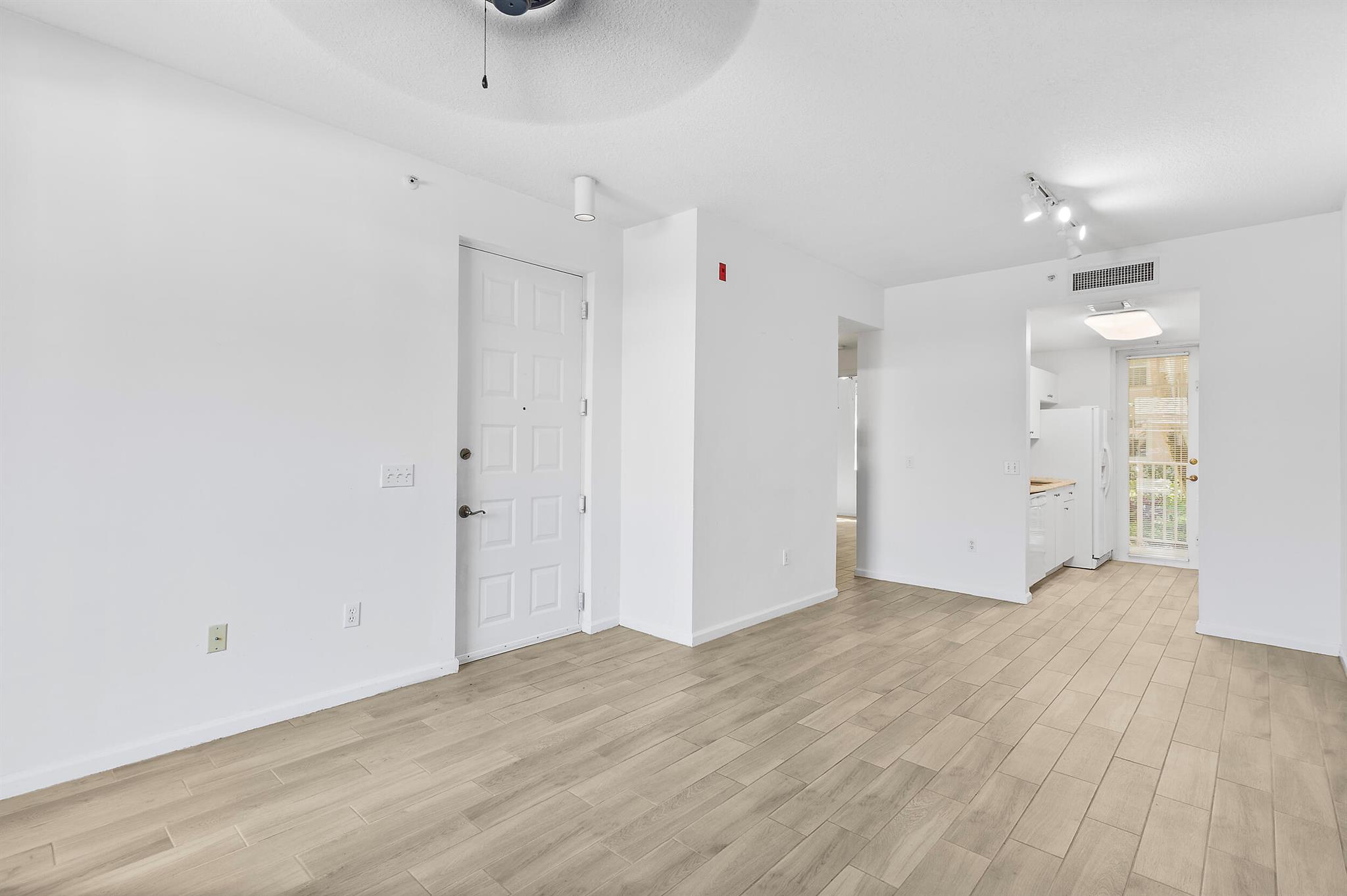 Experience Florida living in this exquisite first-floor condominium located in the heart of Abacoa, Jupiter. This bright and airy residence features elegant tile flooring throughout, enhancing its spacious and inviting ambiance. Natural light floods the interior, offering serene views of the lush courtyard right from your living room.Situated just moments away from Downtown Abacoa, you'll have immediate access to a vibrant array of restaurants, boutiques, and entertainment options. Enjoy the community pool, or take advantage of the nearby Abacoa Community Park, which offers basketball courts, a skate park, and tennis courts for active recreation.