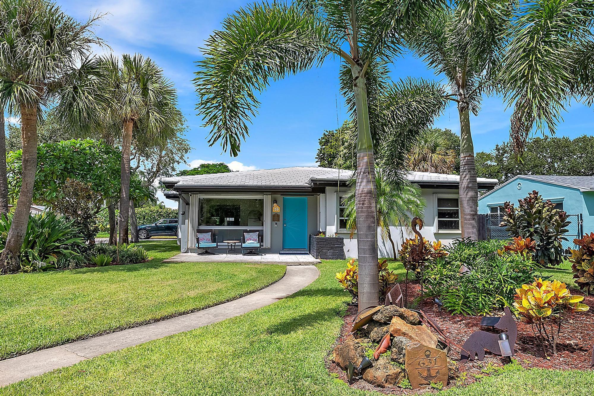 This 2 bedroom 2 bathroom Mid-century home is a perfect mix of vintage charm and modern luxury. Located in the South Palm Park historical district of Lake Worth Beach, this property has the character of its original build, enhanced by tasteful updates for a contemporary lifestyle. With a NEW ROOF (2024) and Generac NATURAL GAS GENERATOR, this home is safe, secure and storm ready. The home is equipped with a new water heater (2024), water softener and a 2017 A/C unit, ensuring comfort and efficiency. The large fully fenced in back yard is perfect for entertaining. The newly renovated interior showcases the home's classic roots with 60's glam theme and beautifully preserved Terrazzo floors that flow throughout. The Kitchen features a gas stove with a hooded vent, a deep farmhouse sink,
