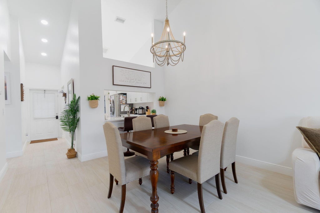 Photo of 1250 PARKSIDE GREEN Drive #B, Greenacres, FL 33415 (MLS # B26075072)