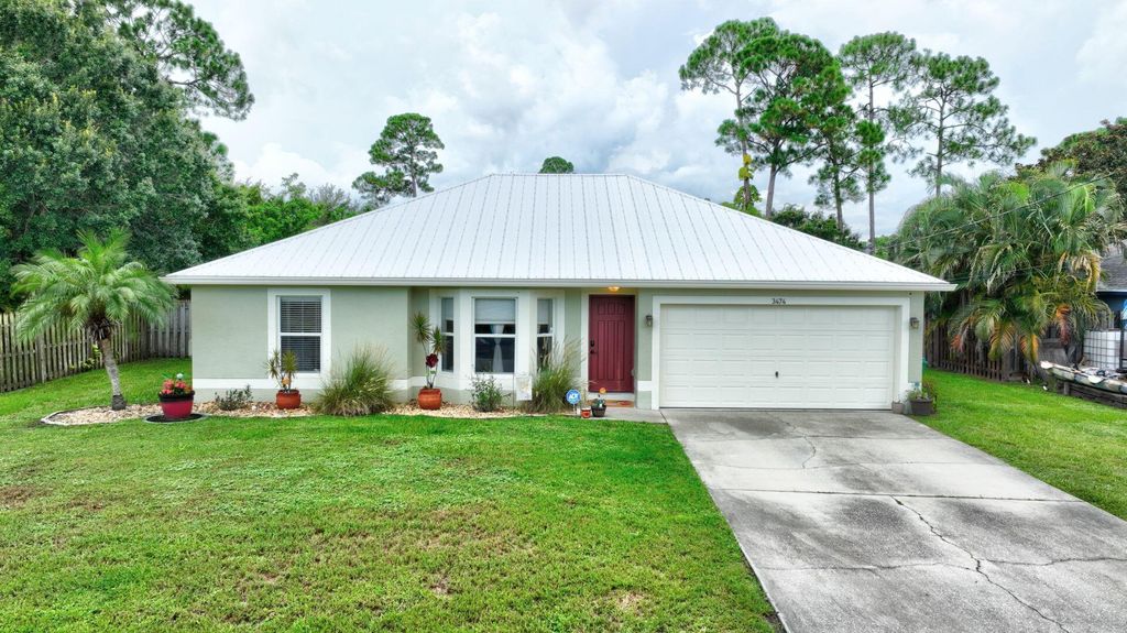 Photo of 3474 SW Martin Street, Port St Lucie, FL 34953 (MLS # R10905671)