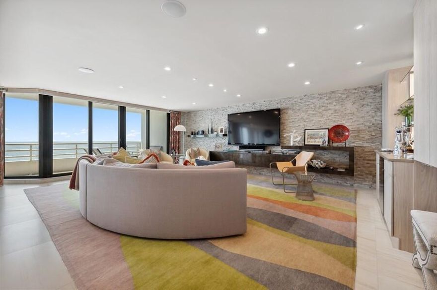 This magnificent 3 bedroom, 3.5 bath residence is the height of oceanfront luxury. Upon entering, you are welcomed by expansive ocean views & stunning design details. The renovated kitchen features sleek white cabinetry w/ hidden appliances, custom lighting & an oversized cook
island with seating. The living room includes a custom stone feature wall with built-in shelving. The large primary suite includes an opulent ensuite bath, walk-in closet with custom built-ins & forever views of the city of Boca Raton. Each of the 2 guest suites feature incredible city views & renovated bathrooms with custom tile work, contemporary cabinetry & fabulous hardware. This spacious oceanfront paradise features porcelain & marble flooring, custom lighting & countless designer details. The Addison On The Ocean is an exclusive oceanfront condominium on the sparkling shore of Boca Raton, Florida. This opulent condominium offers resort-style living for just 169 luxurious residences. Each residence features immense square footage and panoramic vistas of the turquoise Atlantic ocean. The Addison On The Ocean welcomes you with dramatic porte-cochere entries with stunning water features, designer landscaping and premier valet service.

Upon entering the lobby, you are greeted by stunning interior design elements and a backdrop of the glistening ocean. This concierge building features all the lavish amenities one would expect in a 5-star resort. Few condominiums offer dining, The Addison On The Ocean offers dining in the completely renovated restaurant as well as, Al Fresco options on the pool deck, gazebo or while lounging on the ocean. Residents may also gather and entertain in the fully renovated social room. The impeccable food service includes breakfast, lunch, take-out dinners and private event catering.

The Addison On The Ocean embodies the essence of first class living, including on-site management, 24-hour maintenance and in-house concierge. The stress-free lifestyle is enriched by conveniences that may be arranged by the concierge; including housekeeping, automobile care and transportation services.

The 24-hour security team utilizes state of the art communication, while the grounds are monitored with vast video surveillance coverage. BuildingLink technology enables residents, management and staff to interact in real time. The innovations continue with newly installed electric vehicle charging stations.

Health and self-care are of the utmost importance and The Addison On The Ocean embraces a healthy lifestyle with fully renovated wellness areas, including five fitness centers, saunas, steam rooms and massage services. There are an array of recreational facilities including a dog park, aquatic therapy, water aerobics, basketball, volleyball, kayaks, bicycles, paddle boards, ping-pong, billiards, arcade games, a library/business center and a gorgeous social hall. This one-of-a-kind property continues to impress with its luxurious outdoor spaces. These spaces include two completely renovated pools, all new decking, a fabulous al fresco liquor lounge, custom fire-pits and waterfall features.

The Addison On The Ocean is appointed with only the finest trimmings and ultra-luxury amenities, it is Boca Raton's most exclusive oceanfront address.