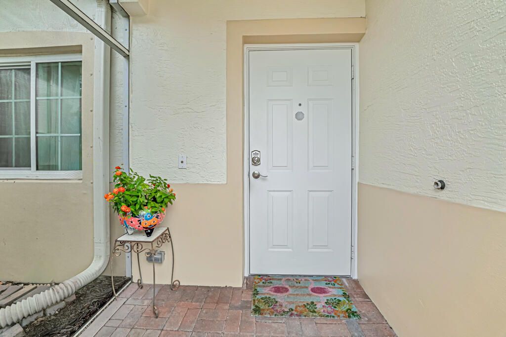 Photo of 9889 Galleon Drive, West Palm Beach, FL 33411 (MLS # R11139030)