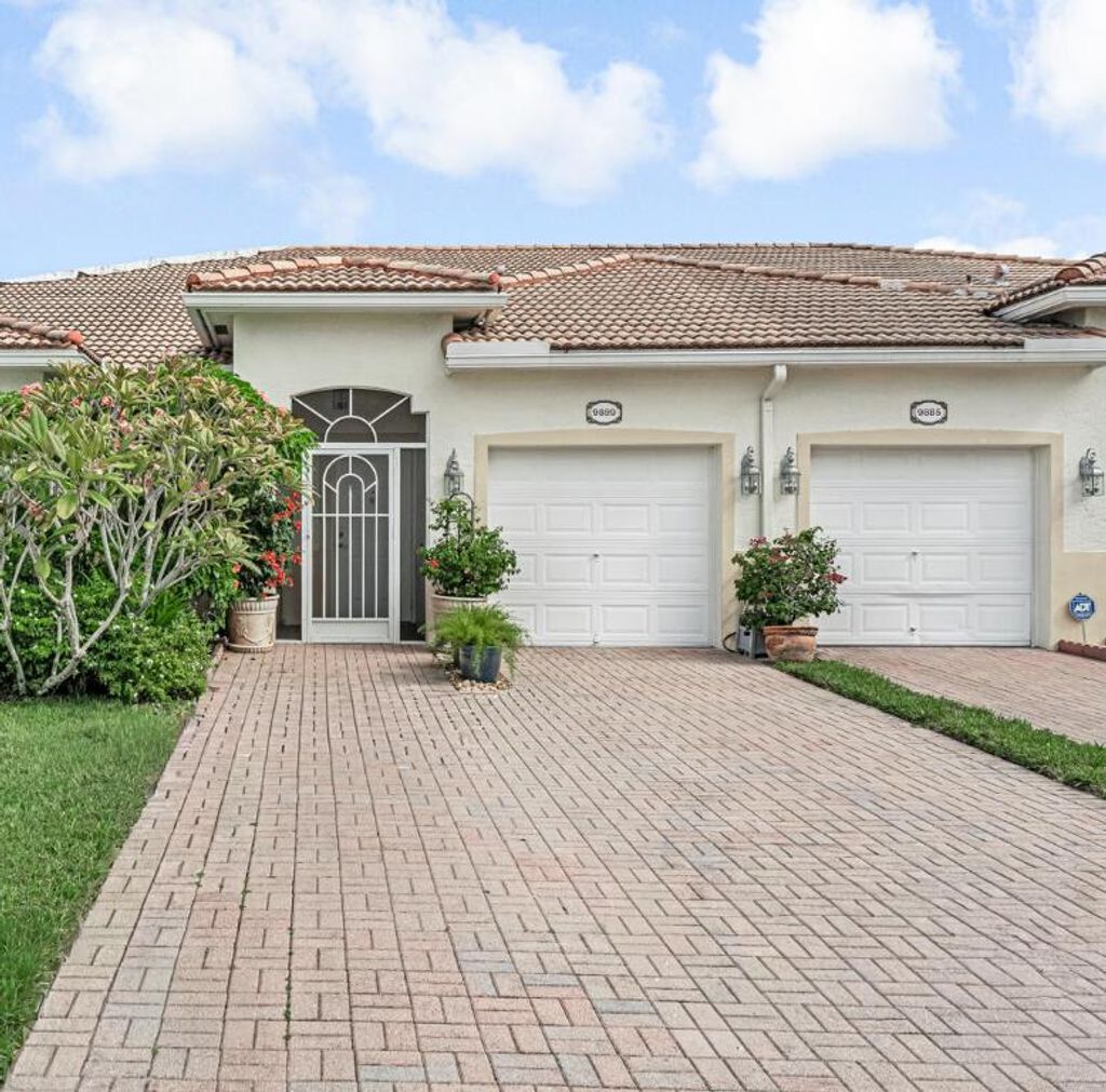 Photo of 9889 Galleon Drive, West Palm Beach, FL 33411 (MLS # R11139030)