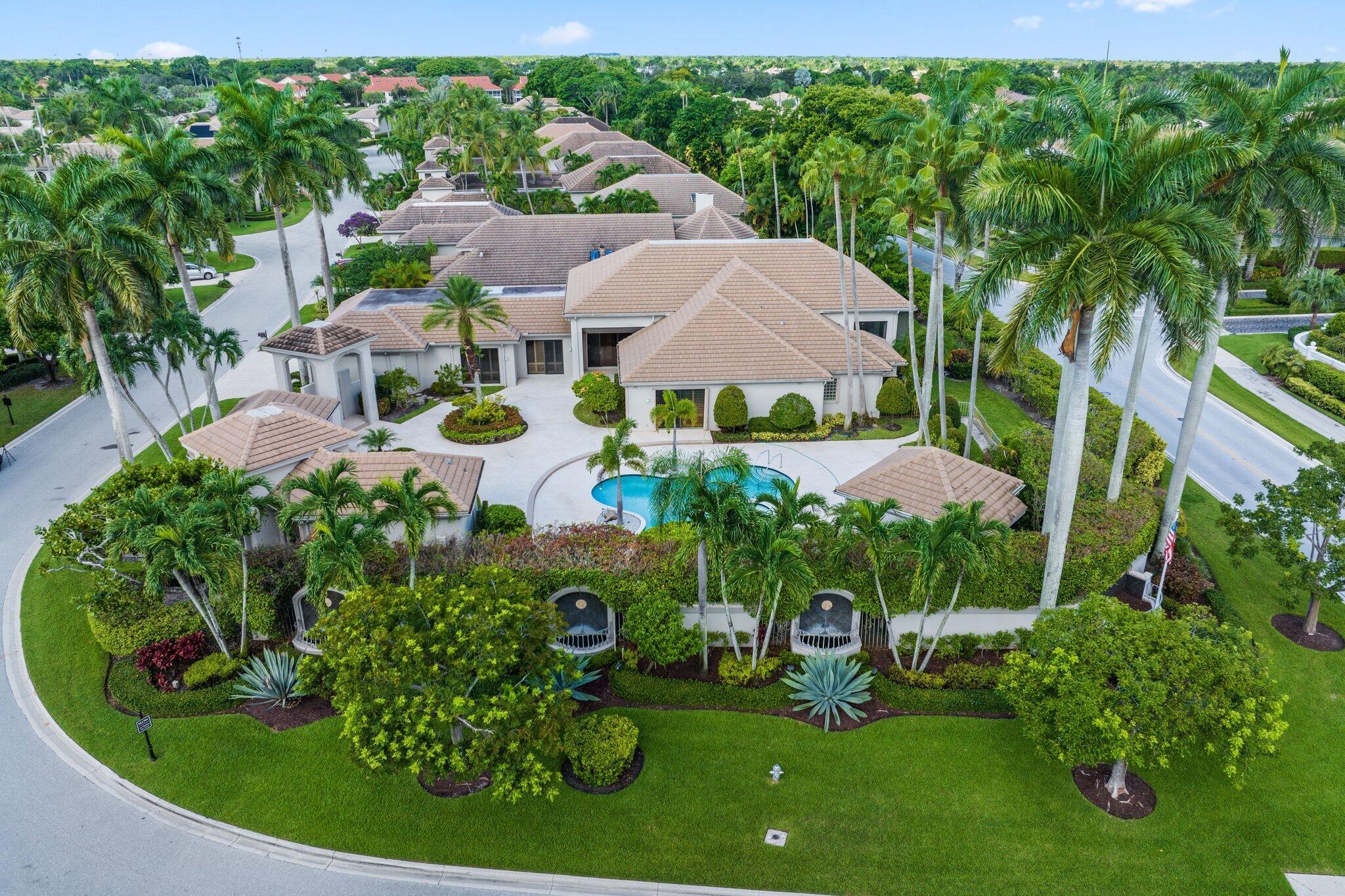 This Extraordinary Single-Story Courtyard Compound, Set on a Rare Double Lot in the Prestigious Country Club at Broken Sound, Offers an Unmatched Fusion of Space and Luxury. With Soaring Volume Ceilings, an Open-Concept Design, and Serene Neutral Tones Throughout, the Home Is Both Elegant and Welcoming. The Resort-Style Generous Courtyard Showcases an Oversized Pool, a Covered Lanai with a Built-In BBQ, and a Private Guest House Featuring Two Bedrooms, Two Full Baths and a Kitchenette! A 3-Car Garage also presents an added bonus! A Spacious Screened-In Patio Overlooks a Verdant Backyard, Perfect for Children and Pets. Positioned on a Prime Corner Setting, This Residence Presents a Rare Opportunity to Create Your Ultimate Dream Retreat.