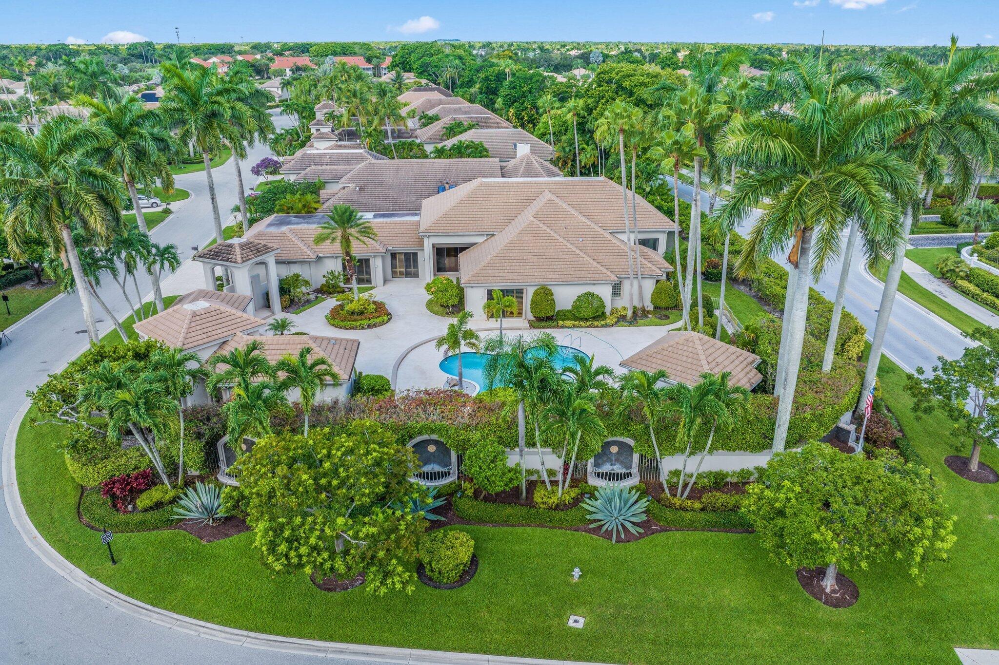 This Extraordinary Single-Story Courtyard Compound, Set on a Rare Double Lot in the Prestigious Country Club at Broken Sound, Offers an Unmatched Fusion of Space and Luxury. With Soaring Volume Ceilings, an Open-Concept Design, and Serene Neutral Tones Throughout, the Home Is Both Elegant and Welcoming. The Resort-Style Generous Courtyard Showcases an Oversized Pool, a Covered Lanai with a Built-In BBQ, and a Private Guest House Featuring Two Bedrooms, Two Full Baths and a Kitchenette! A 3-Car Garage also presents an added bonus! A Spacious Screened-In Patio Overlooks a Verdant Backyard, Perfect for Children and Pets. Positioned on a Prime Corner Setting, This Residence Presents a Rare Opportunity to Create Your Ultimate Dream Retreat.